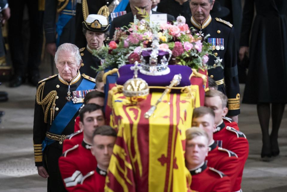 King Charles III and members of the royal family follow behind the Queen’s coffin as it is carried out of Westminster Abbey following the state funeral (Danny Lawson/PA) (PA Wire)