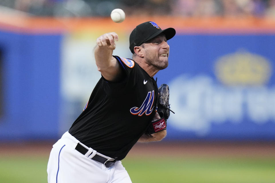 New York Mets' Max Scherzer pitches during the first inning of the team's baseball game against the Washington Nationals on Friday, July 28, 2023, in New York. (AP Photo/Frank Franklin II)