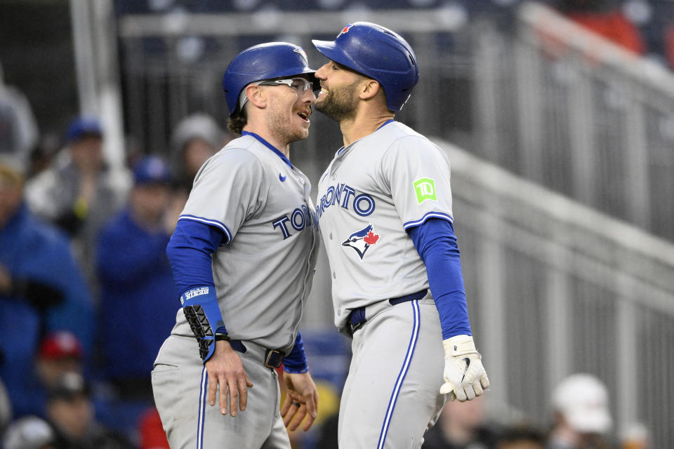 ADDS AMOUNT OF RUNS - Toronto Blue Jays' Kevin Kiermaier, right, celebrates his two-run home run with Danny Jansen during the eighth inning of a baseball game against the Washington Nationals, Saturday, May 4, 2024, in Washington. (AP Photo/Nick Wass)