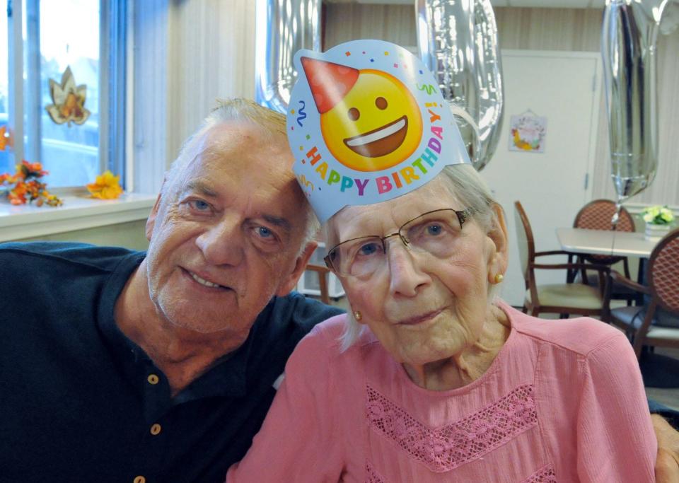 Teddy Zaborski, 79, of Attleboro, shares a moment with his mother, Jennie Zaborski, as she celebrates her 107th birthday at the Webster Park Rehab and Healthcare Center in Rockland on Monday, Nov. 1, 2021.