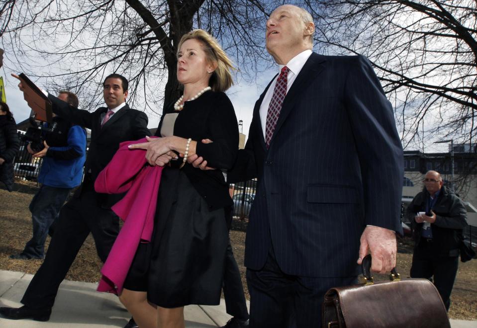 New Jersey Gov. Chris Christie's former Deputy Chief of Staff Bridget Anne Kelly walks with her attorney Michael Critchley, right, as they leave court after a hearing Tuesday, March 11, 2014, in Trenton, N.J. Critchley and attorneys for two-time campaign manager Bill Stepien were in court to try to persuade a judge not to force them to turn over text messages and other private communications to New Jersey legislators investigating the political payback scandal ensnaring Christie's administration. (AP Photo/Mel Evans)