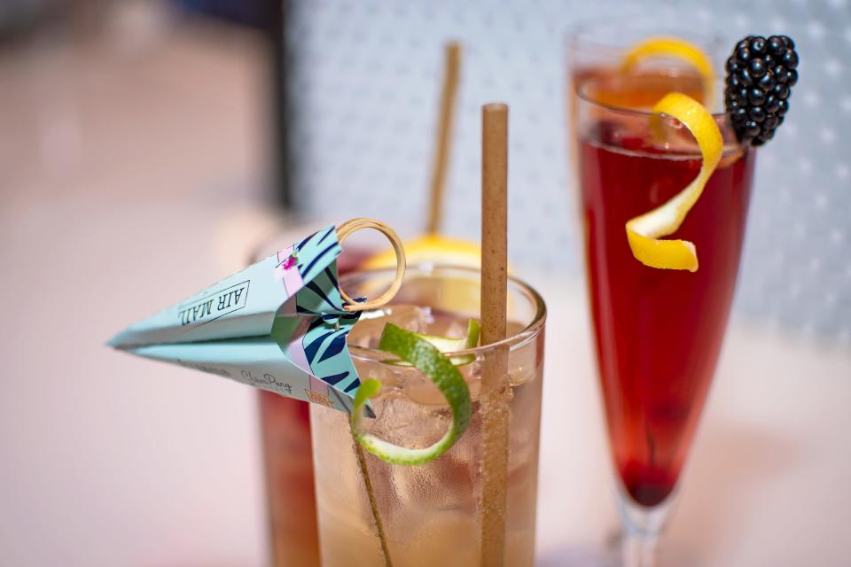 A view of the Airmail cocktail standing alongside signature drinks served at Cham Pang Lanes in Phoenix.