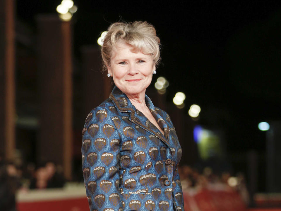 FILE - This Oct. 19, 2019 file photo shows actress Imelda Staunton on the red carpet for the movie "Downton Abbey" at the Rome Film Fest in Rome. Staunton has been tapped to be the last actress to play Queen Elizabeth II in the Netflix series "The Crown." She will take the crown in the fifth and final season of the series. (AP Photo/Domenico Stinellis, File)