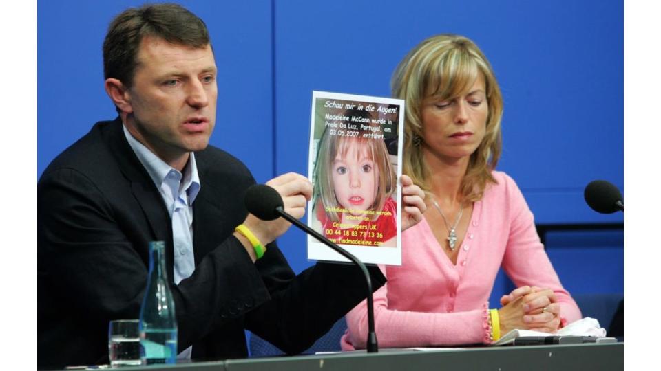 Kate and Gerry McCann hold up a picture of Madeleine during a press conference in 2007