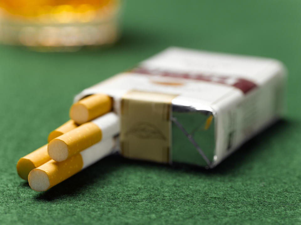 A pack of cigarettes on a table.