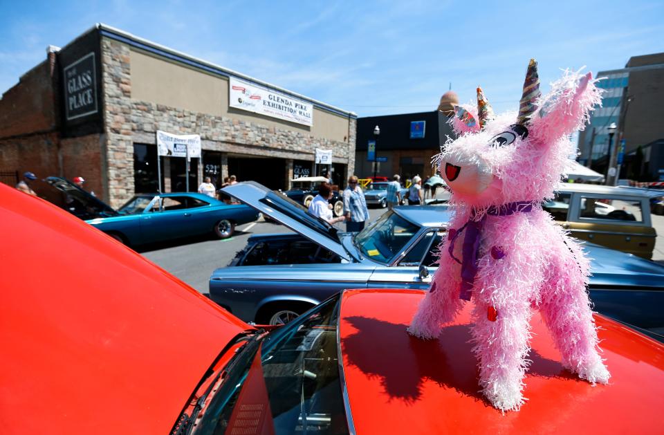 Cars of all different types, ages and colors overtook Downtown Springfield on Friday, Aug. 12, 2022 as the Birthplace of Route 66 Festival got into full swing after a 2-year hiatus due to the COVID-19 pandemic.