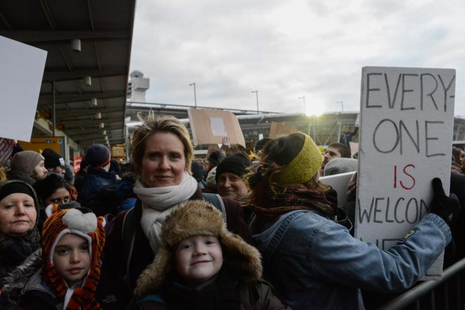 Cynthia Nixon joins protesters rallying against the Muslim immigration ban at John F Kennedy international airport on 18 January 2017 in New York City.