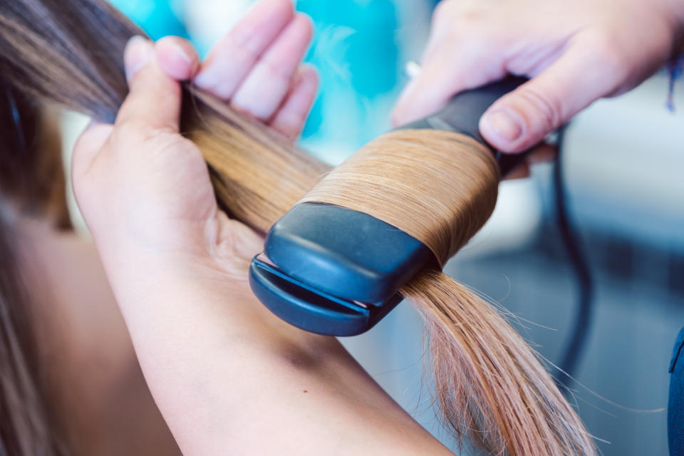 Jennifer Arce and her colleagues discovered that the Brazilian blowout would “reactivate” in clients who had the treatment done elsewhere when their hair was exposed to heat from a blow dryer or flat iron. (Photo: Getty Creative)