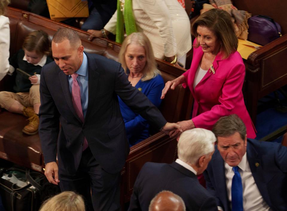 Incoming House Minority Leader Rep. Hakeem Jeffries (D-NY) and former Speaker Nancy Pelosi on the floor at the start of The 118th session of Congress begins on Jan. 3, 2023.