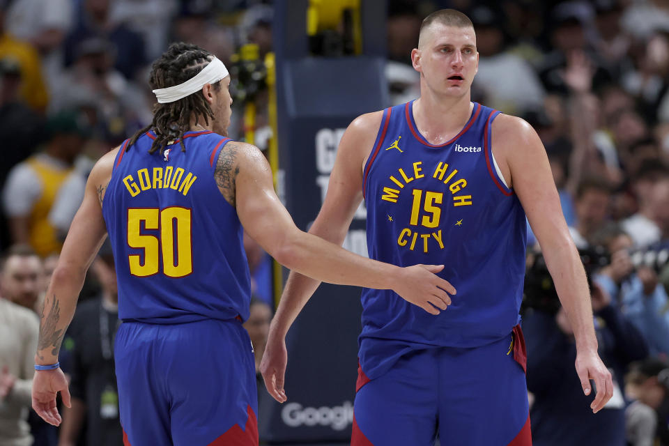 DENVER, COLORADO - APRIL 20: Aaron Gordon #50 and Nikola Jokic #15 of the Denver Nuggets celebrate their win against the Los Angeles Lakers during game one of the Western Conference First Round Playoffs at Ball Arena on April 20, 2024 in Denver, Colorado.  NOTE TO USER: User expressly acknowledges and agrees that, by downloading and or using this photograph, User is consenting to the terms and conditions of the Getty Images License Agreement. (Photo by Matthew Stockman/Getty Images)