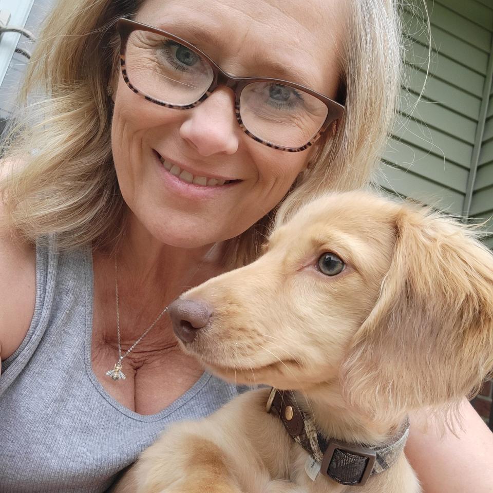 Tammy Vincik of Ravenna with Blue, a dapple dachshund she bought from April (Simon) Waidman in Mahoning County. Vincik is one of at many who accused Waidman of breaking puppy sales agreements. She never got a second animal she said she bought.