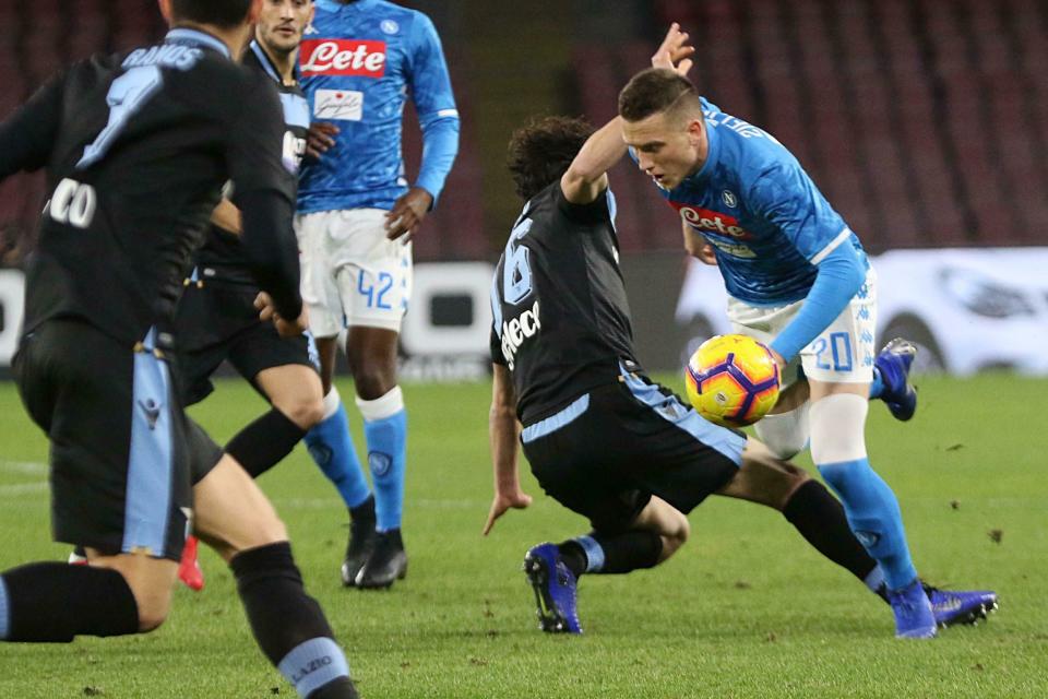 Napoli's midfielder Piotr Zielinski, right, controls the ball, during the Italian Serie A soccer match between SSc Napoli and SS Lazio at the San Paolo stadium in Naples, Sunday, Jan. 20, 2019. (Cesare Abbate/Ansa via AP)