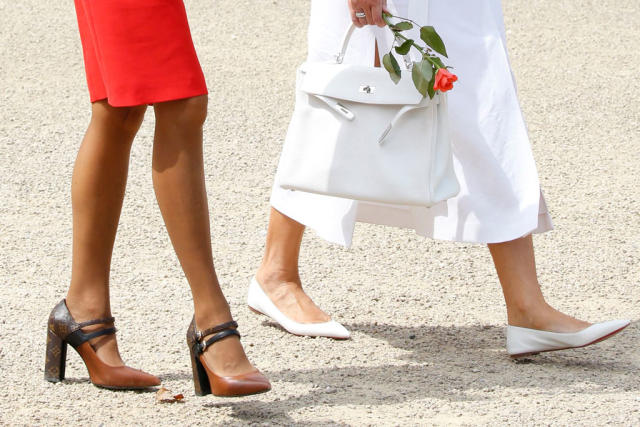 France's First Lady Pops in Red Dress & Graphic Block Heels With Melania  Trump