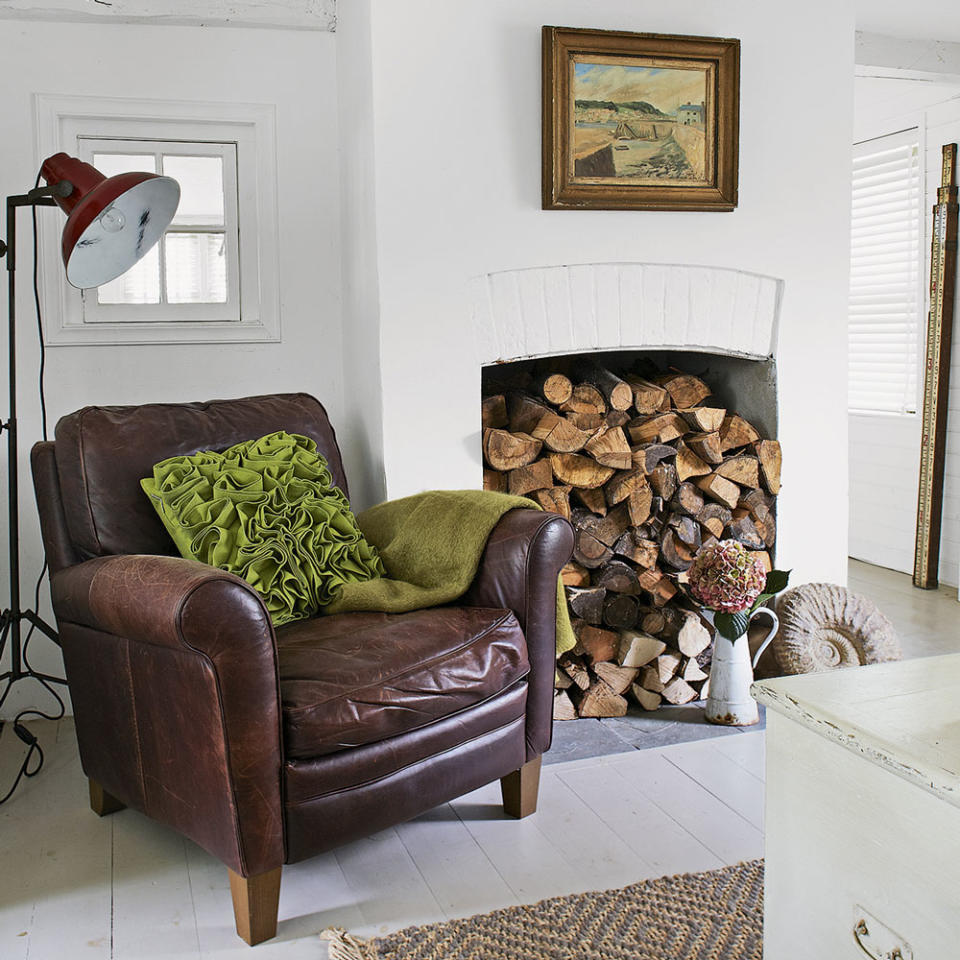 living room with logs stacked fireplace