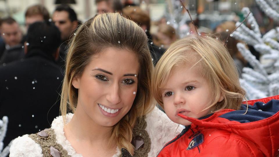 Stacey Solomon with her son Leighton attend Disney's "Frozen" celebrity screening at the Odeon Leicester Square on November 17, 2013 in London, England.