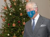 <p>Prince Charles sports a face mask during an end-of-year visit to the Royal Mail.</p>