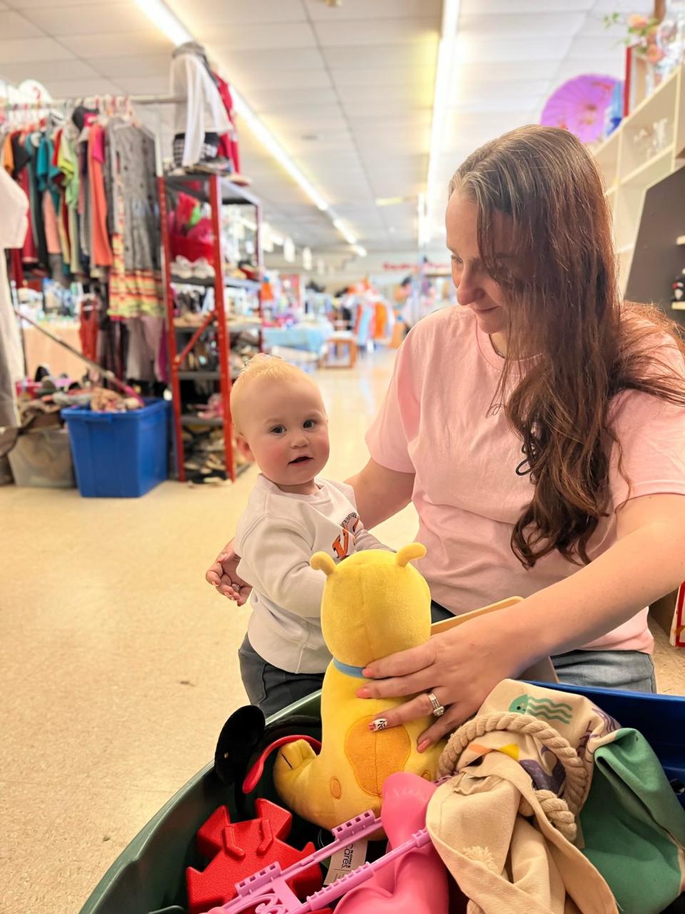 Amelia checks out the toys that are for sale. 
Tara Allen turned the former Frugality Thrift Store on Edgemoor Road in Powell, Tennessee, into The ReSale Rack Thrift Store on Oct. 1, 2023.