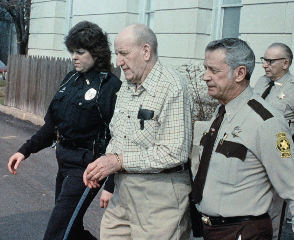 Ray Copeland being escorted to jail