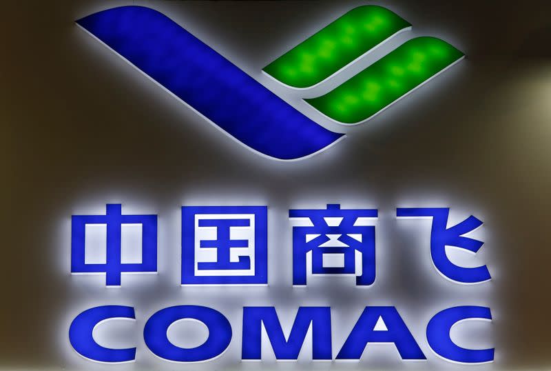 FILE PHOTO: A COMAC logo is pictured at their booth at the Singapore Airshow