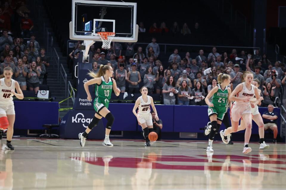 Loudonville's Sophia Spangler pushes the ball up the floor in the Div. IV state semifinals against Waterford.