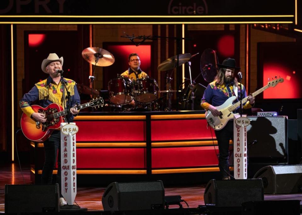 The Shootouts, a Northeast Ohio-based country music band, performs last month at the Grand Ole Opry in Nashville. Ryan Humbert, left, is a North Canton resident. The band has an Ohio album release show at Lions Lincoln Theatre in Massillon on Saturday.