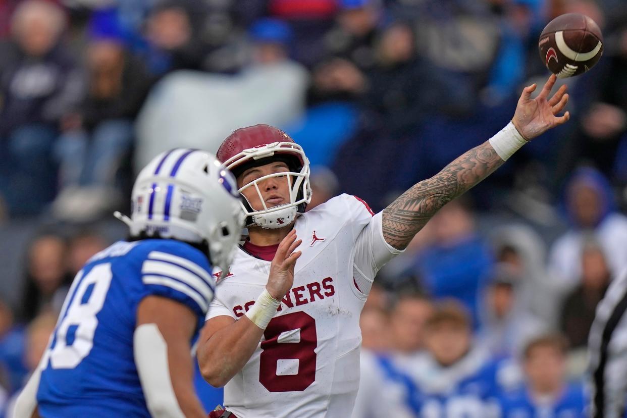 Oklahoma quarterback Dillon Gabriel (8) throws during the first half of an NCAA college football game against BYU, Saturday, Nov. 18, 2023, in Provo, Utah. (AP Photo/Rick Bowmer)