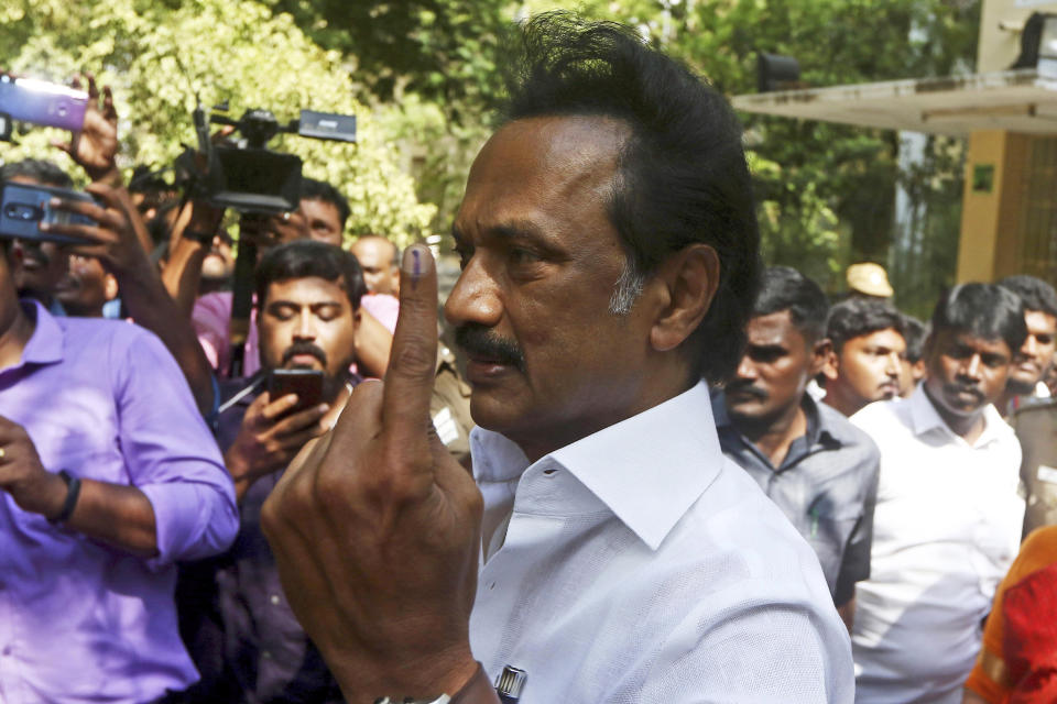 Dravida Munnetra Kazhagam (DMK) leader M.K. Stalin displays the indelible ink mark on his finger after casting his vote during the second phase of India's general elections in Chennai, India, Thursday, April 18, 2019. The Indian election is taking place in seven phases over six weeks in the country of 1.3 billion people. Some 900 million people are registered to vote for candidates to fill 543 seats in India's lower house of Parliament. (AP Photo/R. Parthibhan)