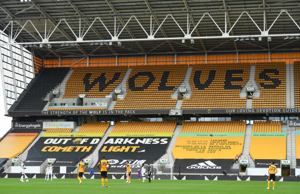 WOLVERHAMPTON, ENGLAND - OCTOBER 04: A general view of the Wolves wording on the seats in the stand during the Premier League match between Wolverhampton Wanderers and Fulham at Molineux on October 04, 2020 in Wolverhampton, England. Sporting stadiums around the UK remain under strict restrictions due to the Coronavirus Pandemic as Government social distancing laws prohibit fans inside venues resulting in games being played behind closed doors. (Photo by Stu Forster/Getty Images)