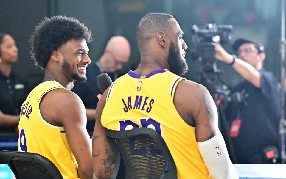 Los Angeles Lakers #23 LeBron James and his son #9 Bronny James attend the Lakers media day at UCLA Health Training Center in El Segundo, California, September 30, 2024. (Photo by Frederic J. BROWN / AFP) (Photo by FREDERIC J. BROWN/AFP via Getty Images)