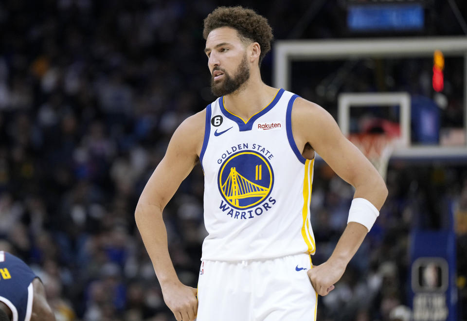 SAN FRANCISCO, CALIFORNIA - OCTOBER 14: Klay Thompson #11 of the Golden State Warriors looks on against the Denver Nuggets during the first half of an NBA basketball game at Chase Center on October 14, 2022 in San Francisco, California. NOTE TO USER: User expressly acknowledges and agrees that, by downloading and or using this photograph, User is consenting to the terms and conditions of the Getty Images License Agreement. (Photo by Thearon W. Henderson/Getty Images)