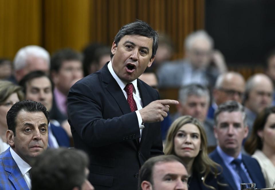 Conservative MP Michael Chong rises during Question Period in the House of Commons amid recent revelations that China targeted his family members who lived in Hong Kong. THE CANADIAN PRESS/Justin Tang