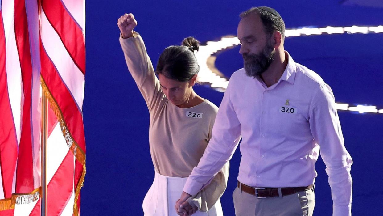 PHOTO: Jon Polin and Rachel Goldberg, parents of Hersh Goldberg-Polin, who is being held hostage in Gaza, leave the stage after speaking on Day 3 of the Democratic National Convention, in Chicago, Aug. 21, 2024.  (Mike Blake/Reuters)