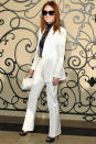 <p><strong>1 October</strong> Julianne Moore arrived to see Clare Waight Keller's Givenchy debut wearing a tailored white suit from the designer's first collection for the fashion house.</p>