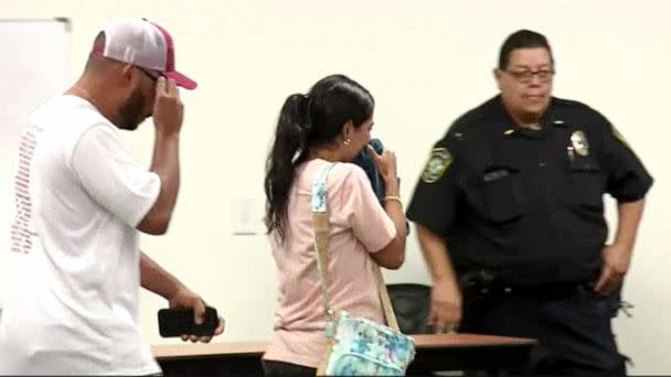 PHOTO: Emotional attendees exit the City Council meeting in Uvalde, Texas, June 30, 2022. (KSAT)