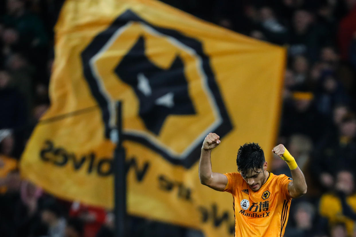 WOLVERHAMPTON, ENGLAND - DECEMBER 27: Raul Jimenez of Wolverhampton Wanderers celebrates after scoring a goal to make it 2-2 during the Premier League match between Wolverhampton Wanderers and Manchester City at Molineux on December 27, 2019 in Wolverhampton, United Kingdom. (Photo by Sam Bagnall - AMA/Getty Images)