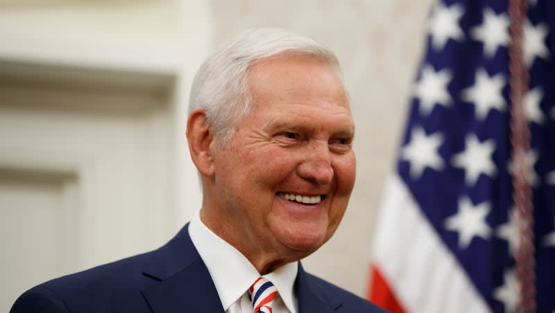 FILE - Former NBA basketball player and general manager Jerry West smiles before President Donald Trump presents him the Presidential Medal of Freedom, in the Oval Office of the White House, Thursday, Sept. 5, 2019, in Washington. Jerry West, who was selected to the Basketball Hall of Fame three times in a legendary career as a player and executive and whose silhouette is considered to be the basis of the NBA logo, died Wednesday morning, June 12, 2024, the Los Angeles Clippers announced. He was 86.