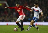 Britain Football Soccer - Manchester United v Wigan Athletic - FA Cup Fourth Round - Old Trafford - 29/1/17 Manchester United's Henrikh Mkhitaryan in action with Wigan Athletic's Sam Morsy Action Images via Reuters / Jason Cairnduff Livepic EDITORIAL USE ONLY. No use with unauthorized audio, video, data, fixture lists, club/league logos or "live" services. Online in-match use limited to 45 images, no video emulation. No use in betting, games or single club/league/player publications. Please contact your account representative for further details.