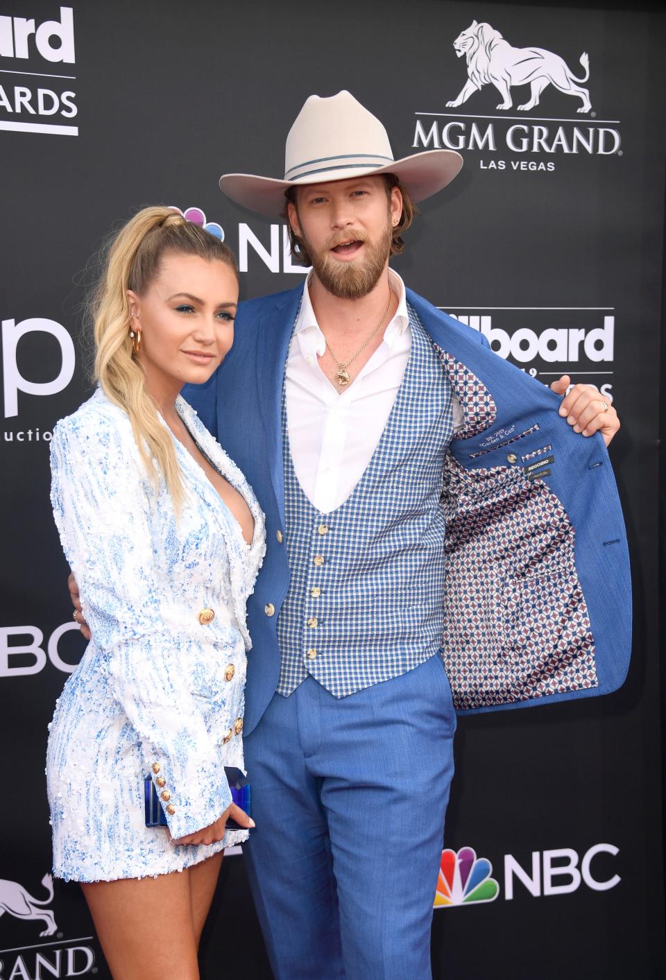 Brittney Marie Cole Kelley and Brian Kelley of Florida Georgia Line attend the 2019 Billboard Music Awards at MGM Grand Garden Arena on May 01, 2019 in Las Vegas, Nevada.