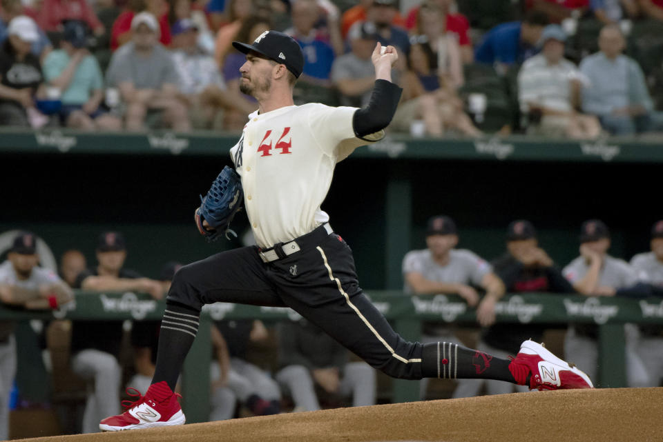 Texas Rangers starting pitcher Andrew Heaney (44) delivers in the top of the first inning in a baseball game against the Cleveland Guardians in Arlington, Texas, Saturday, July 15, 2023. (AP Photo/Emil T. Lippe)