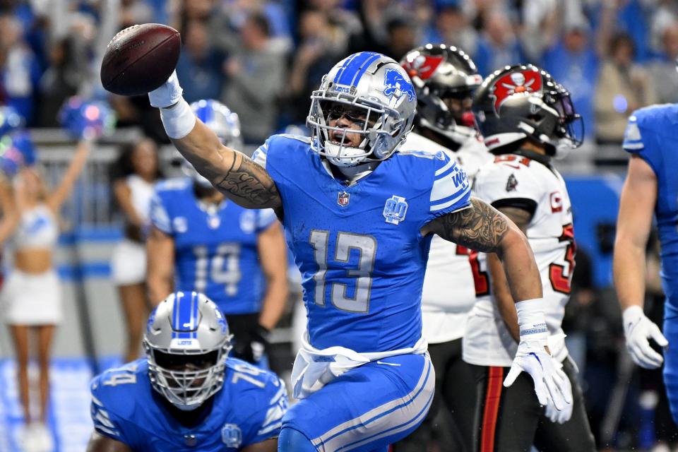 Detroit Lions running back Craig Reynolds scores a touchdown against the Tampa Bay Buccaneers during the second half of Sunday's NFC divisional round playoff game at Ford Field.