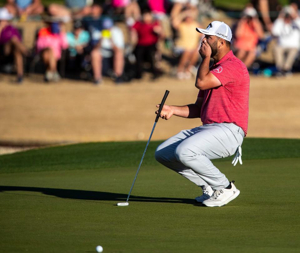 Jon Rahm reacts to a narrowly missed putt on the 17th green that could have secured him the tournament win during the final round of The American Express on the Pete Dye Stadium Course at PGA West in La Quinta, Calif., Sunday, Jan. 22, 2023.