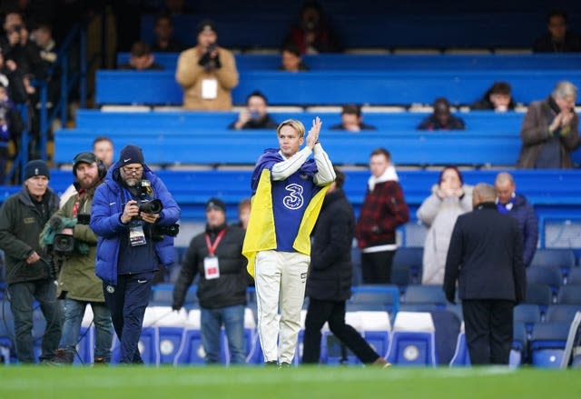 New Chelsea signing Mykhailo Mudryk on the pitch at half time of the match against Crystal Palace (Mike Egerton/PA).