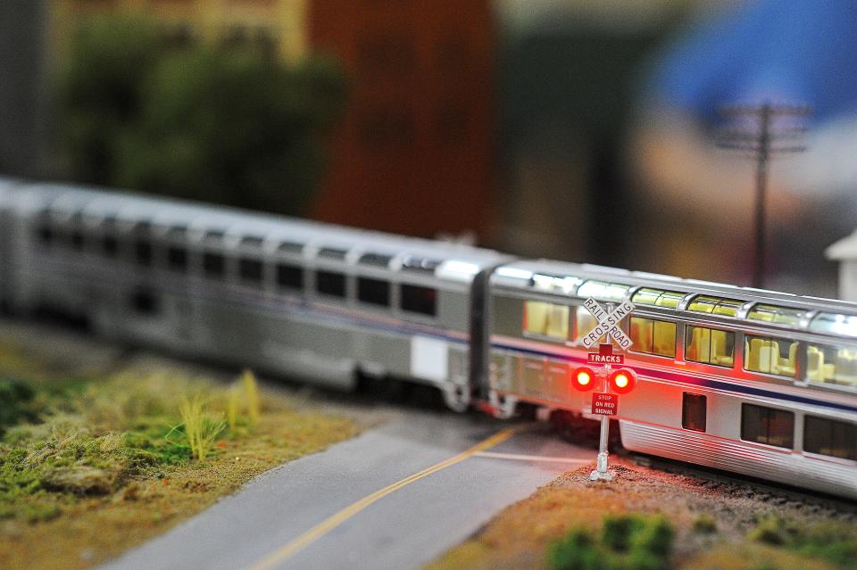 The Free-Mo Modelers model train layout during the Trains At Christmas Model Railroad Show and Swap Meet Sunday, Nov. 22, 2015, in the Expo building at the W.H. Lyon Fairgrounds in Sioux Falls. "We keep getting bigger and bigger," said Wayne Hanson, with the Sioux Valley Model Engineers Society who organized the event. More than 500 hundred adults--Hanson said they don't count the children--made their way through the Expo building on Saturday during the Trains at Christmas event, and in the past more than 1,000 have attended the weekend-long event, Hanson explained. "It's the enthusiasm of the little kids that makes it all," said Judy Payne, of Apple Valley, Minn., who runs the B&J Railroad booth, which is made of LEGO blocks and takes about 10 hours for two adults to set up. 