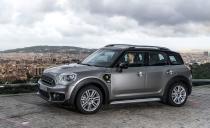 <p>The <a rel="nofollow noopener" href="https://www.caranddriver.com/reviews/2018-mini-cooper-s-e-countryman-all4-plug-in-hybrid-test-review" target="_blank" data-ylk="slk:Cooper S E Countryman ALL4;elm:context_link;itc:0;sec:content-canvas" class="link ">Cooper S E Countryman ALL4</a> not only has one of the longest names in Mini's fleet, but it also is the heaviest among modern not-so-mini Minis. Its plug-in hybrid setup-the "E" in its name-mashes together a turbocharged three-cylinder gas engine powering the front wheels and an electric motor spinning the rears, plus a 7.6-kWh battery. Electric-only driving range is a low-enough-to-make-you-question-the-S-E-Countryman-ALL4's-necessity 12 miles.</p>