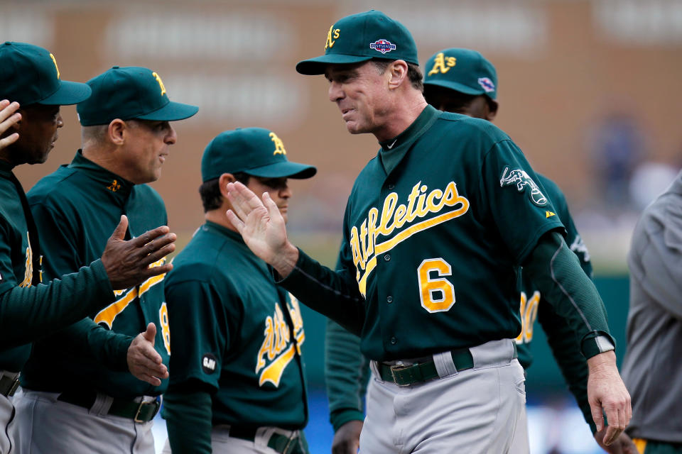 Manager Bob Melvin of the Oakland Athletics greets his players during introductions against the Detroit Tigers during Game One of the American League Divisional Series at Comerica Park on October 6, 2012 in Detroit, Michigan. (Photo by Gregory Shamus/Getty Images)