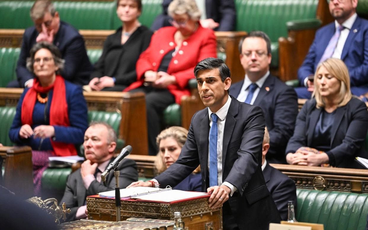 Rishi Sunak with Tory MPs behind him in the Commons earlier this week