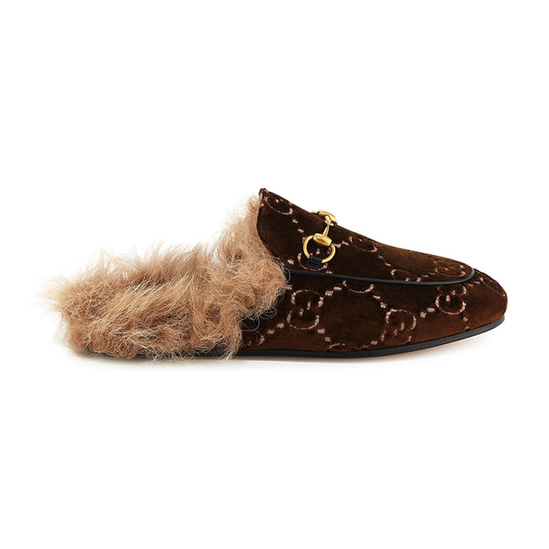 <a rel="nofollow noopener" href="https://www.gucci.com/us/en/pr/women/womens-shoes/womens-moccasins-loafers/princetown-gg-velvet-slipper-p-4486579JT102060?position=16&listName=PGUS4Cols&categoryPath=Women/Womens-Shoes/Womens-Slippers-Mules" target="_blank" data-ylk="slk:Princetown GG Velvet Mule Loafer, Gucci, $940;elm:context_link;itc:0;sec:content-canvas" class="link ">Princetown GG Velvet Mule Loafer, Gucci, $940</a>