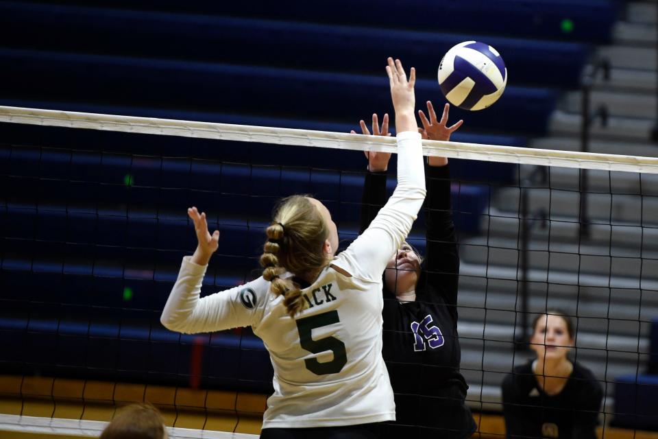 Academy of Richmond County’s Macon Jones (15) hits the ball over the net during a game at Grovetown High School on Wednesday, July 13, 2022. 