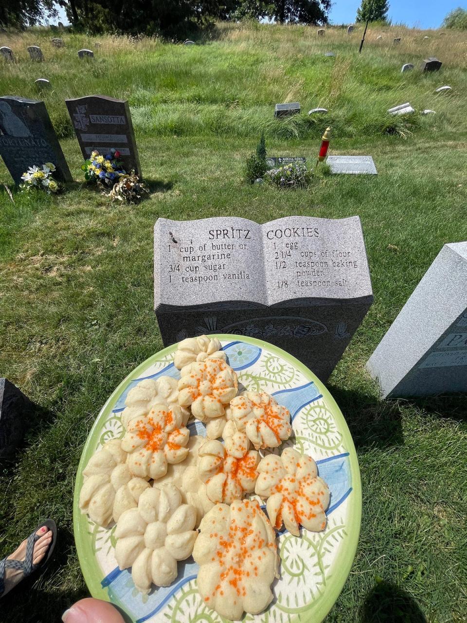 Naomi Odessa Miller-Dawson’s gravestone is shaped like an open cookbook and shares a recipe for spritz cookies (Rosie Grant)
