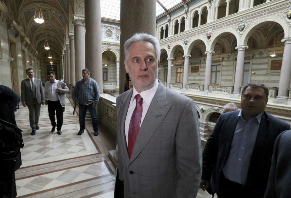 Ukrainian oligarch Dymitro Firtash arrives for the start of his trial at the Austrian supreme court in Vienna, Austria, Tuesday, June 25, 2019. Austrian supreme court rules on extradition case of Ukrainian oligarch Dymitro Firtash to the US. (AP Photo/Ronald Zak)